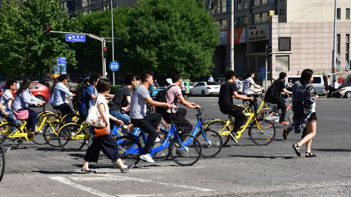 经济观察网-共享单车中场酣战 共赢还是寡头垄